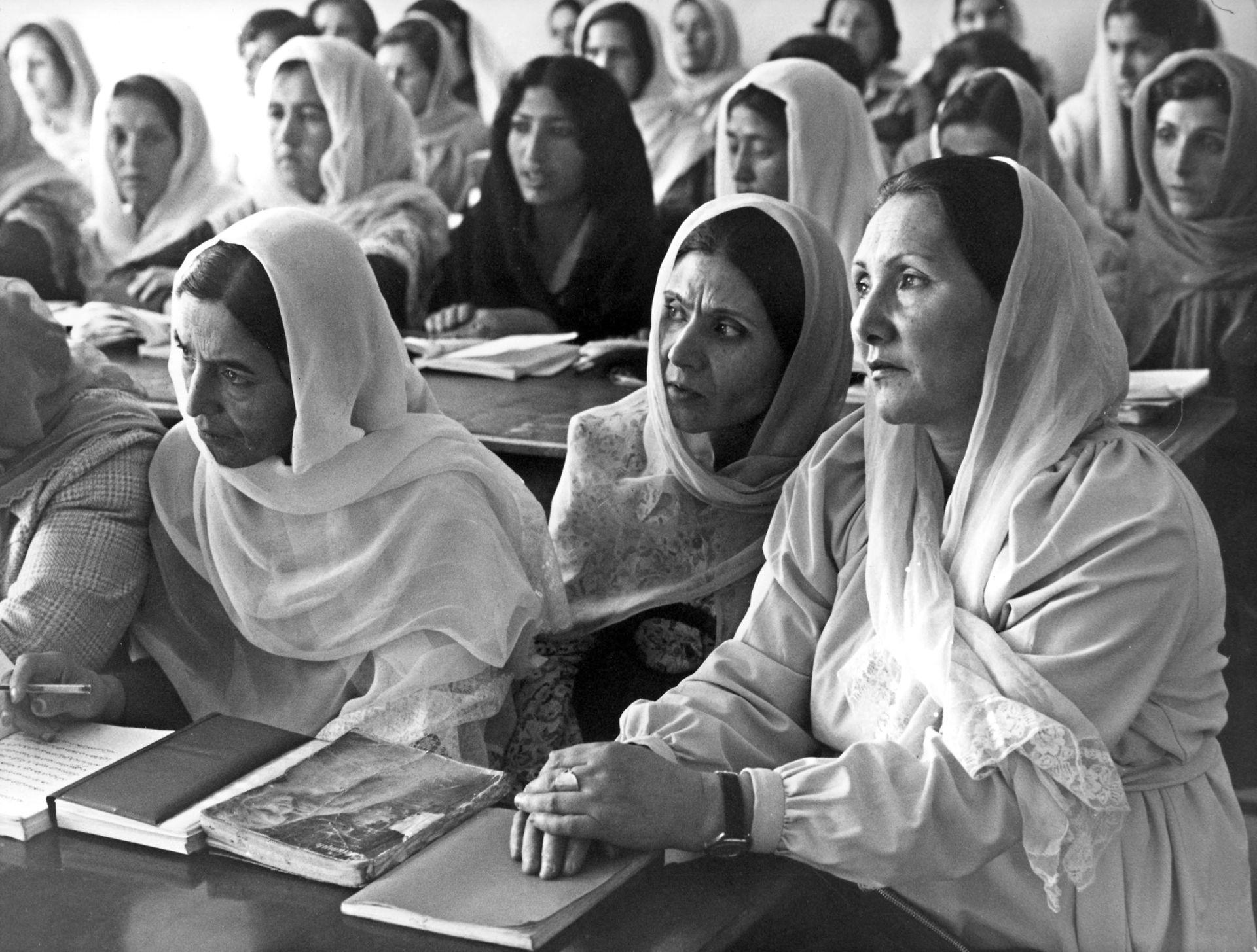 Photo by AFP: Afghan women attend a workplace literacy course in Kabul in the 1980s